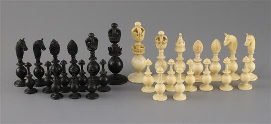 A mid 19th century Anglo Indian turned black stained and natural ivory chess set, kings 3.5in.